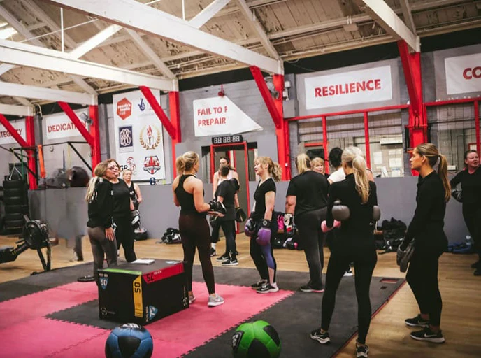 Women training together in the Revenge Boxing gym